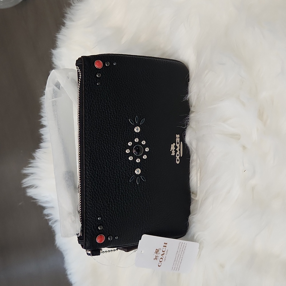 NWT. Coach Western Rivits pebbled leather wristlet
